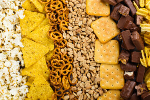 Nuts, pretzels and other snacks lined up.