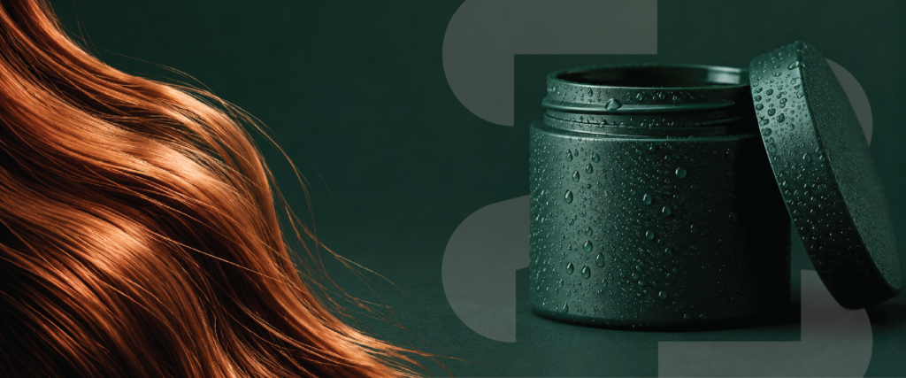 Copper-red hair on the left beside a green insulated water bottle against a dark teal background.